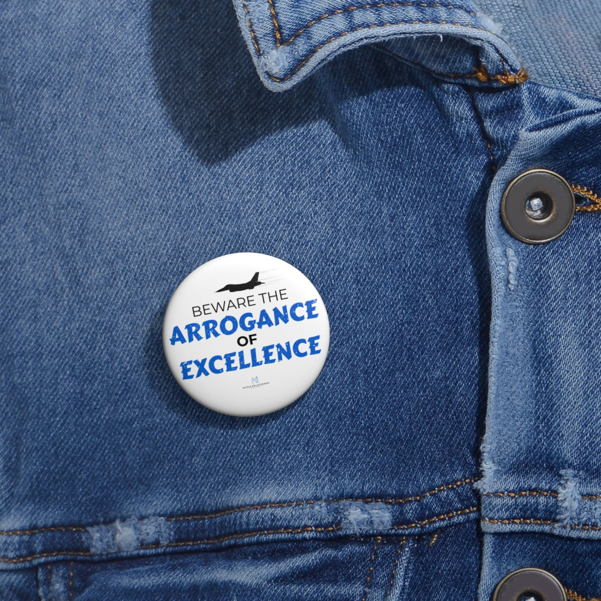"Beware The Arrogance Of Excellence" Badge Pin